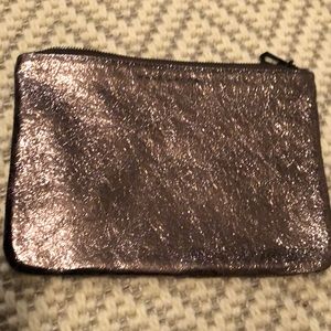 Bronze metallic clutch.